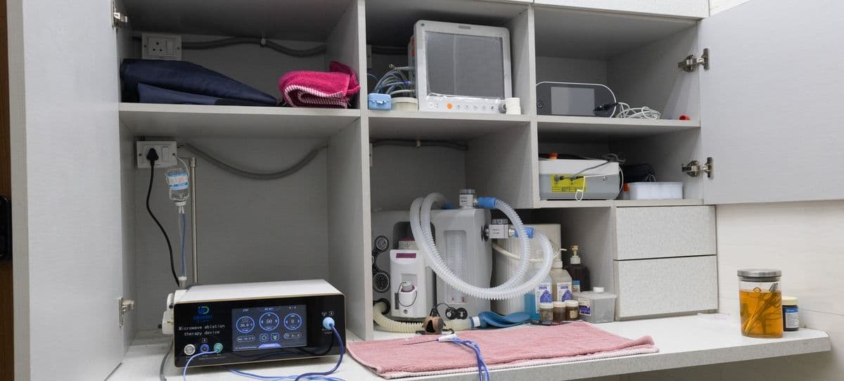 Wildlife Rescue operating theater with anesthesia machine, microwave ablation device, monitors, and surgical supplies