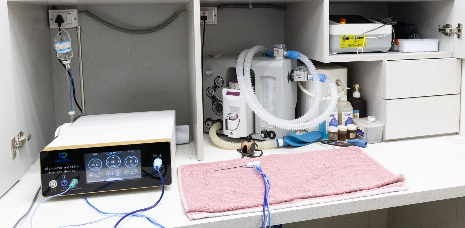 Gas anesthesia setup alongside the microwave ablation machine in the Wildlife Rescue operating theater